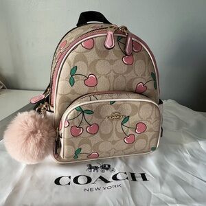 cherry coach backpack Mini Court In Signature Canvas With Heart Print Fabric Lininghandle With 2 14 Drop Outside Zip Pocket Adjustable Shoulder Straps10 34 (L) X 12 12 (H) X 4 34 (W) Tote Bag Coach Backpack Charm